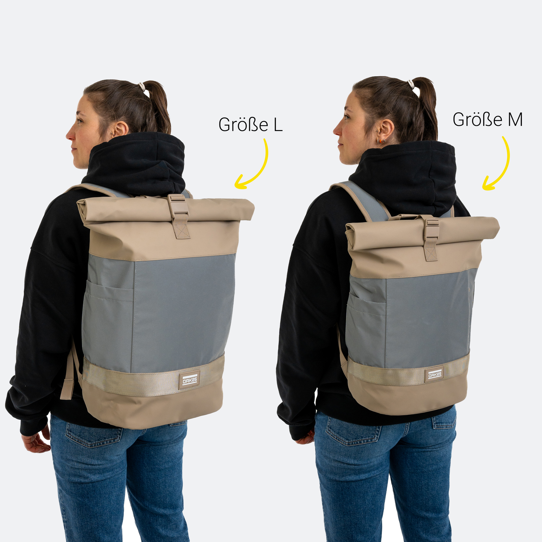 Frau trägt zwei sandfarbene OAK25 Rolltop-Rucksäcke in Größe L und M mit reflektierendem grauem Mittelteil