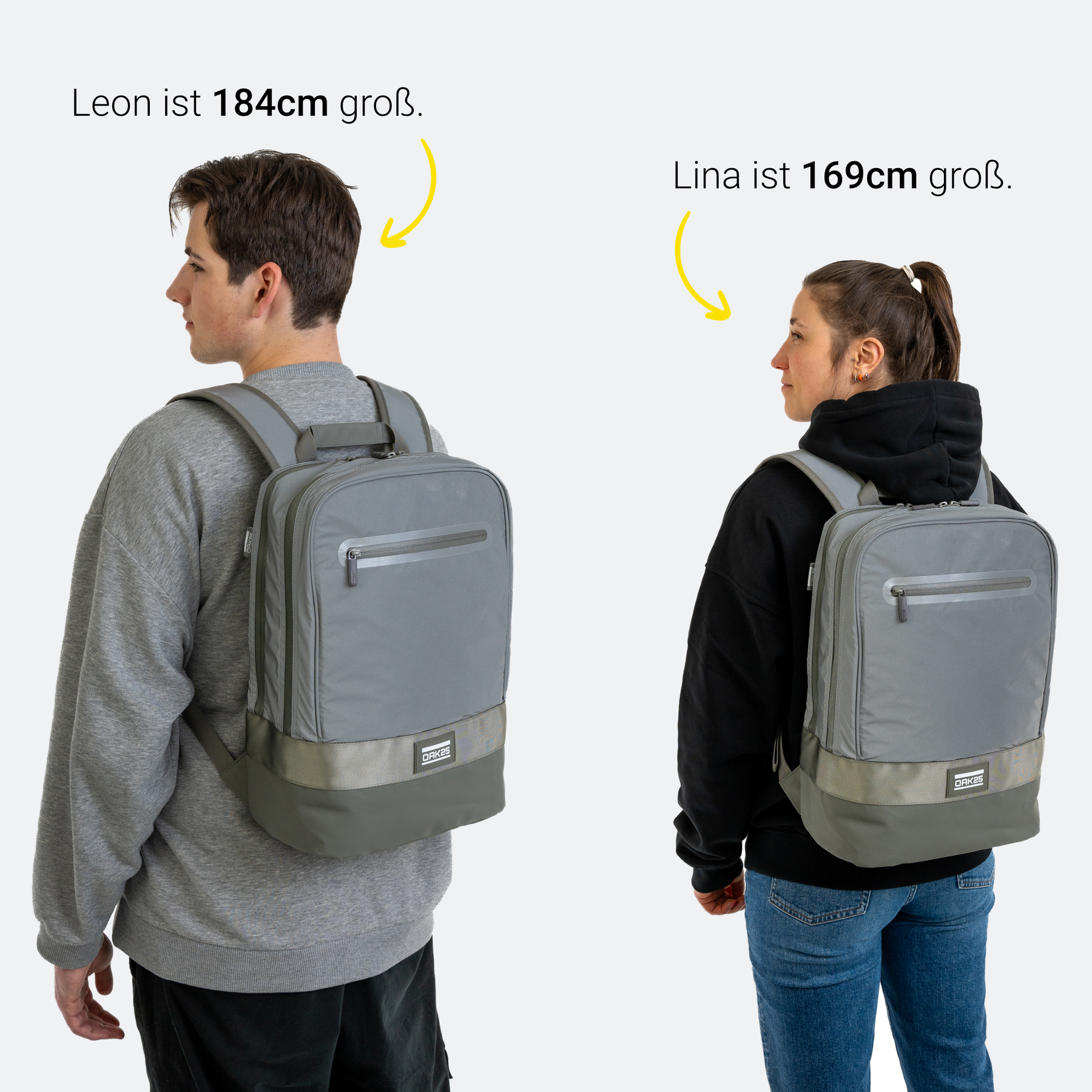 Mann und Frau mit grauen OAK25 Rucksäcken, Leon ist 184 cm groß, Lina ist 169 cm groß