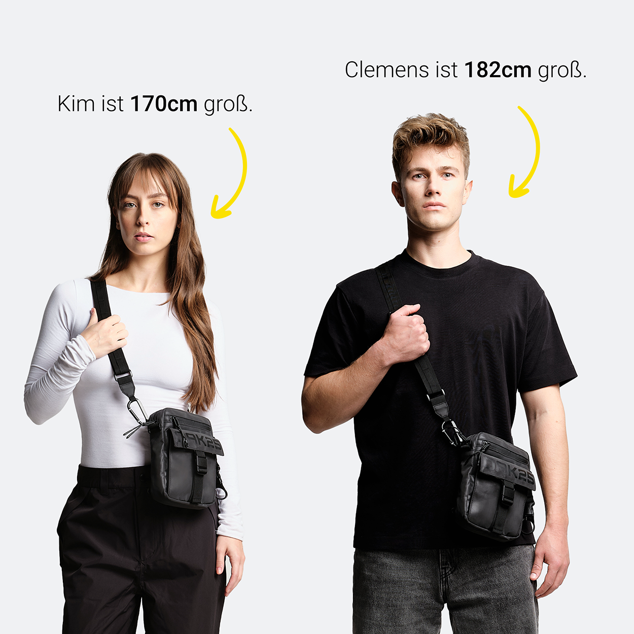 Eine Frau mit 170 cm und ein Mann mit 182 cm tragen jeweils eine schwarze Bauchtasche von OAK25 über der Schulter